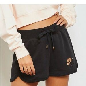 Nike Women's Black Shorts with Gold Air Logo
